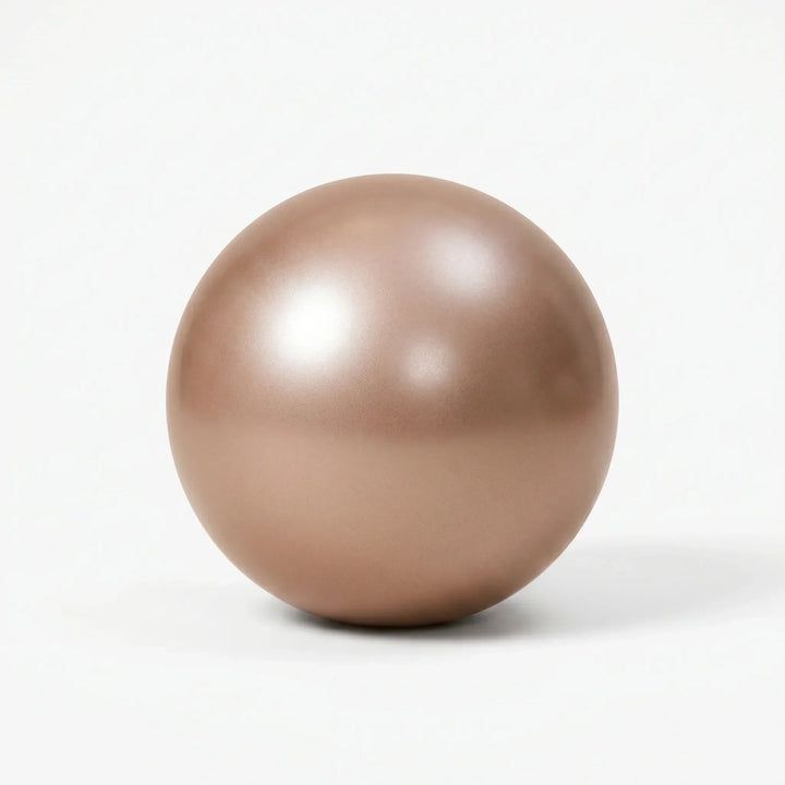 Compact mini exercise ball for Pilates, yoga, and core strength; perfect for portable home fitness equipment.