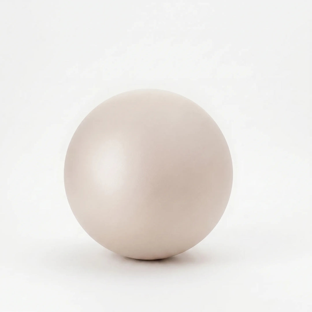 Durable mini exercise ball for Pilates, yoga, and targeted core strength exercises, essential home gym fitness.