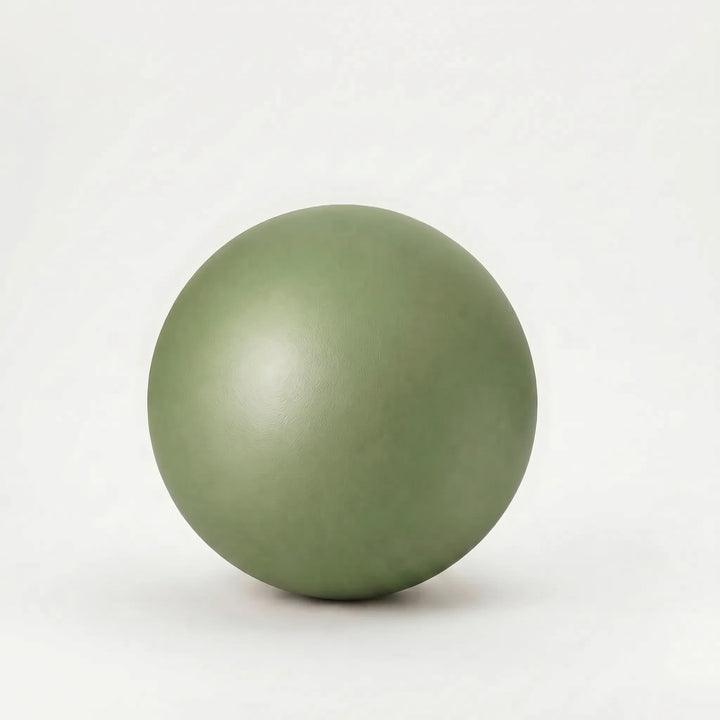Versatile mini yoga & pilates ball, essential fitness equipment for core, flexibility, and strength training.