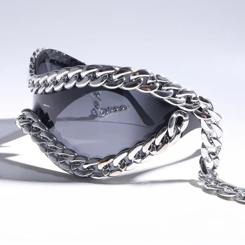 Stylish unisex mirrored sunglasses. Black frame, silver chain accent. Perfect statement glasses for any look.