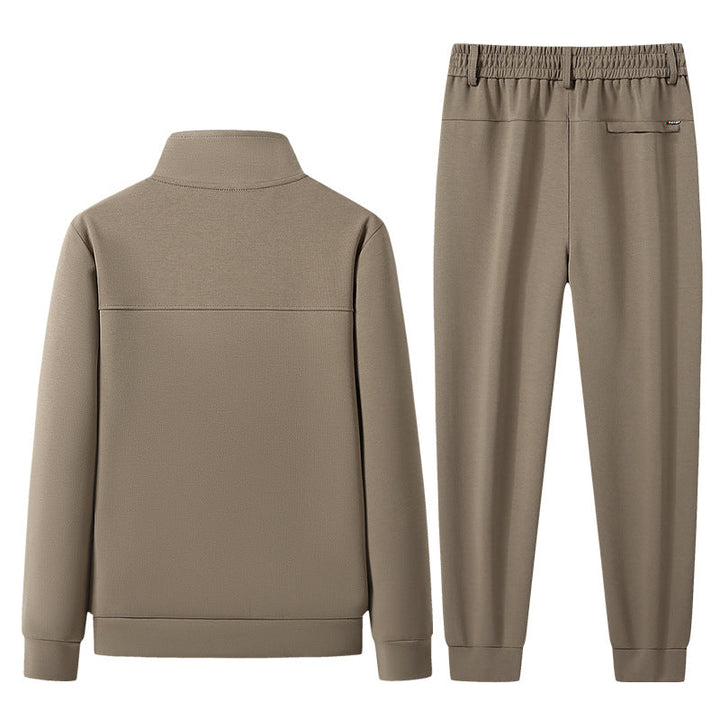 Deep black unisex tracksuit set for activewear & sporty outfits. Modern comfort, matching top & joggers.