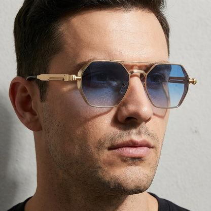 Modern unisex gold frame sunglasses with gradient lenses. Essential UV400 eye protection accessory.
