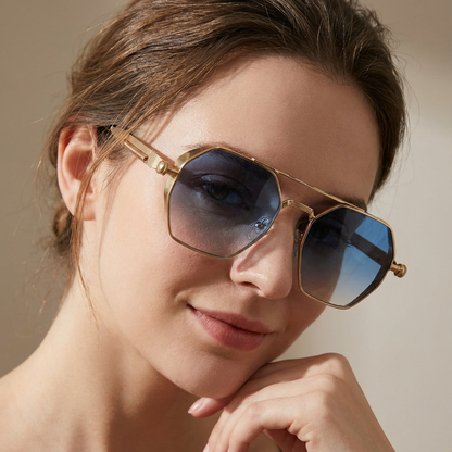 Stylish gradient lens sunglasses, unisex gold frame. UV400 protection eyewear for fashion.