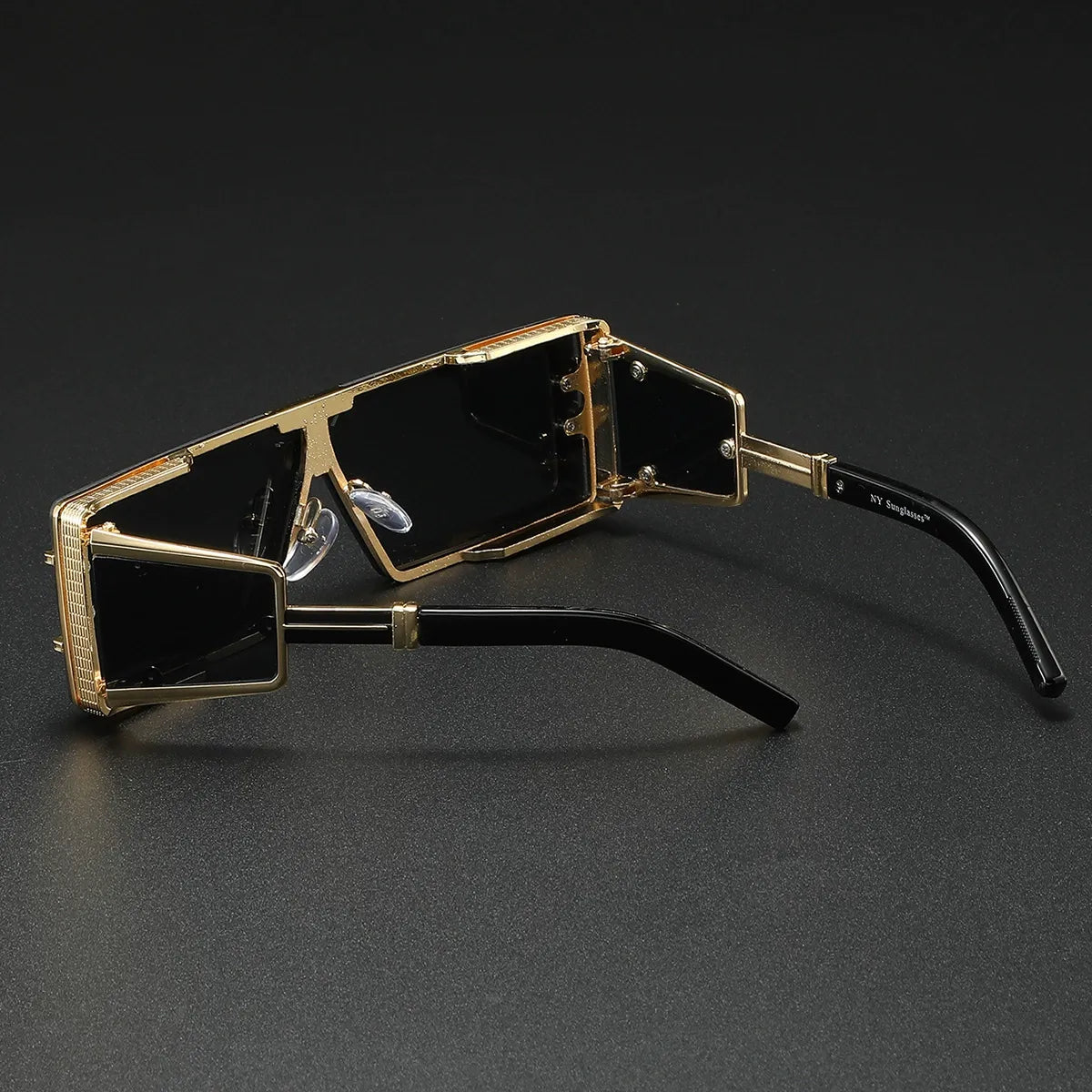 Lightweight unisex fashion eyewear, modern metal sunglasses, offering full UV400 protection & style.