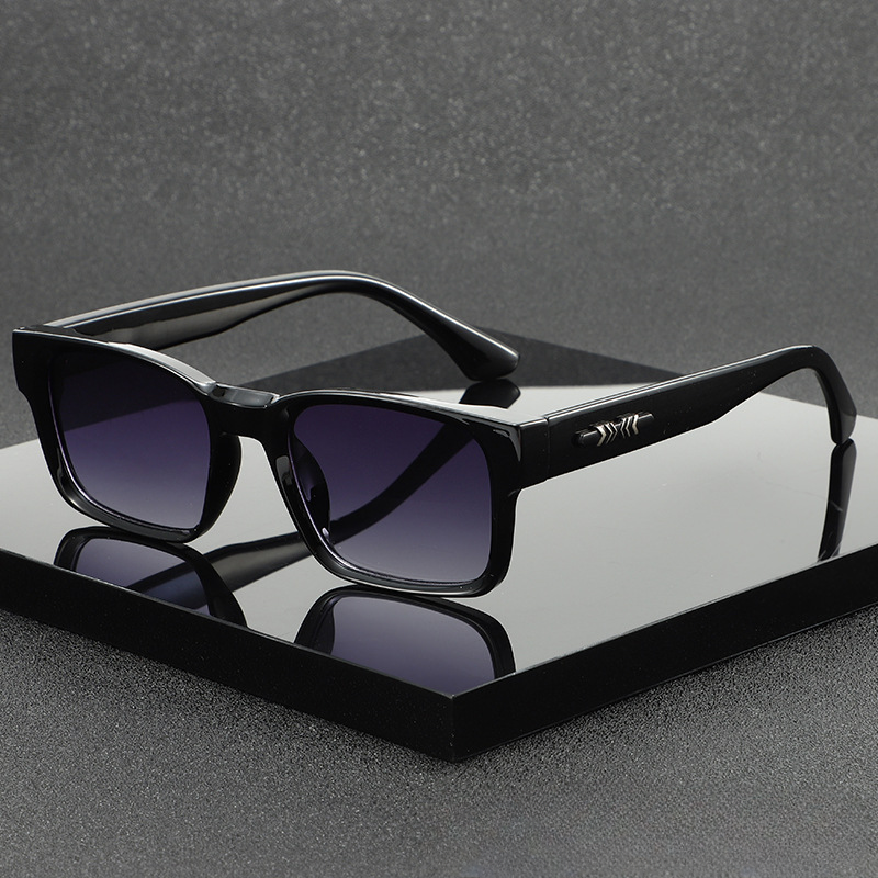 Modern square frame sunglasses, a chic unisex fashion accessory. UV400 protected eyewear.