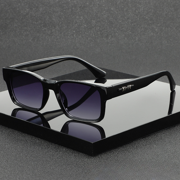 Modern square frame sunglasses, a chic unisex fashion accessory. UV400 protected eyewear.