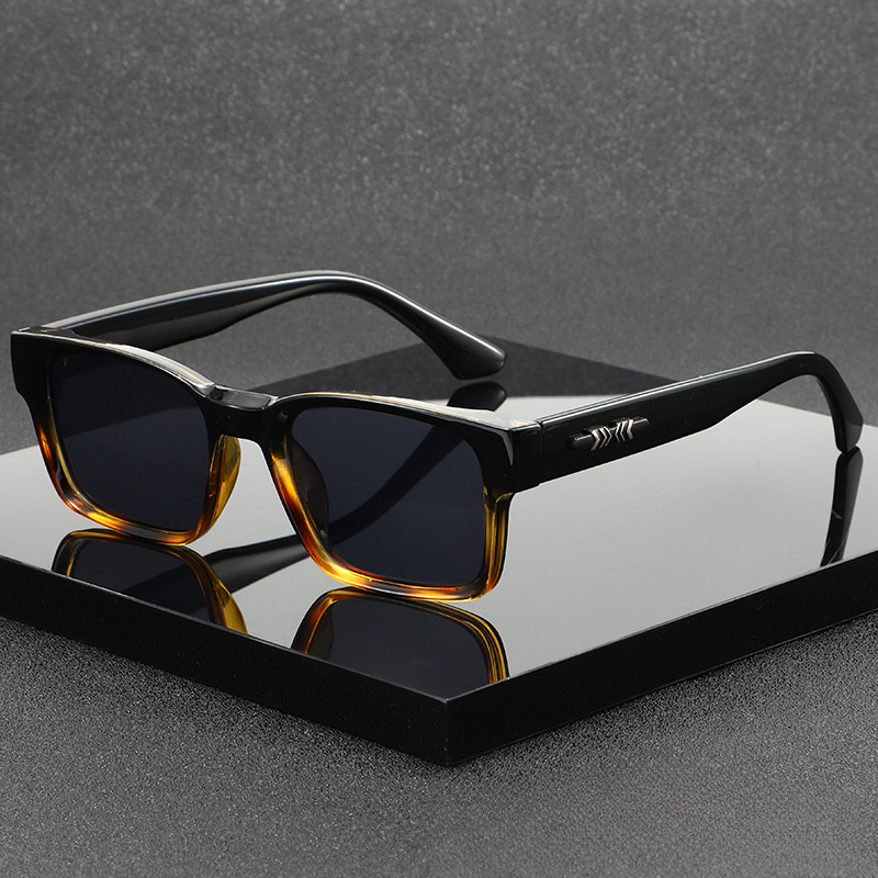 Stylish unisex modern square sunglasses with dual tone frames, lightweight design & UV400 eye protection.