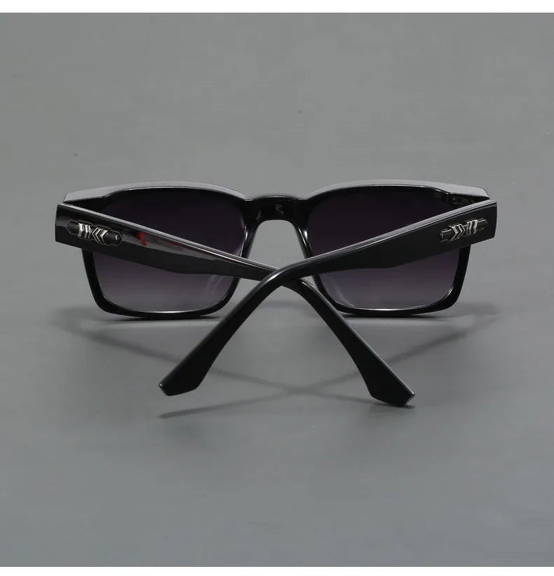 Comfortable unisex square frame sunglasses offering superior UV protection. Lightweight modern shades.