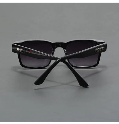 Comfortable unisex square frame sunglasses offering superior UV protection. Lightweight modern shades.