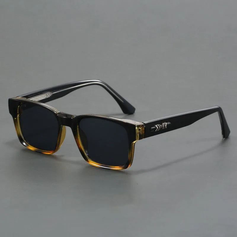 Sleek unisex modern square sunglasses, black, UV protection. Fashion-forward eye protection for sun.