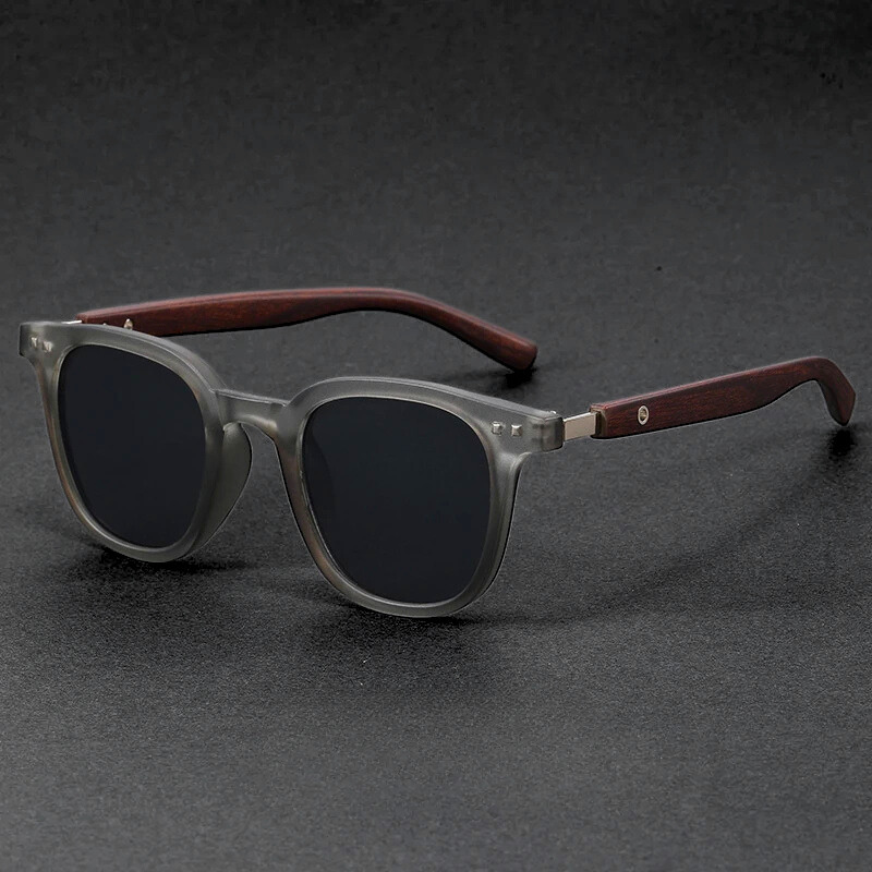 Lightweight unisex modern sunglasses featuring a scratch-resistant acetate & wood frame.