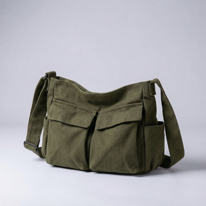 Compact travel organizer bag, lightweight canvas with multiple pockets. Keep essentials organized & safe.