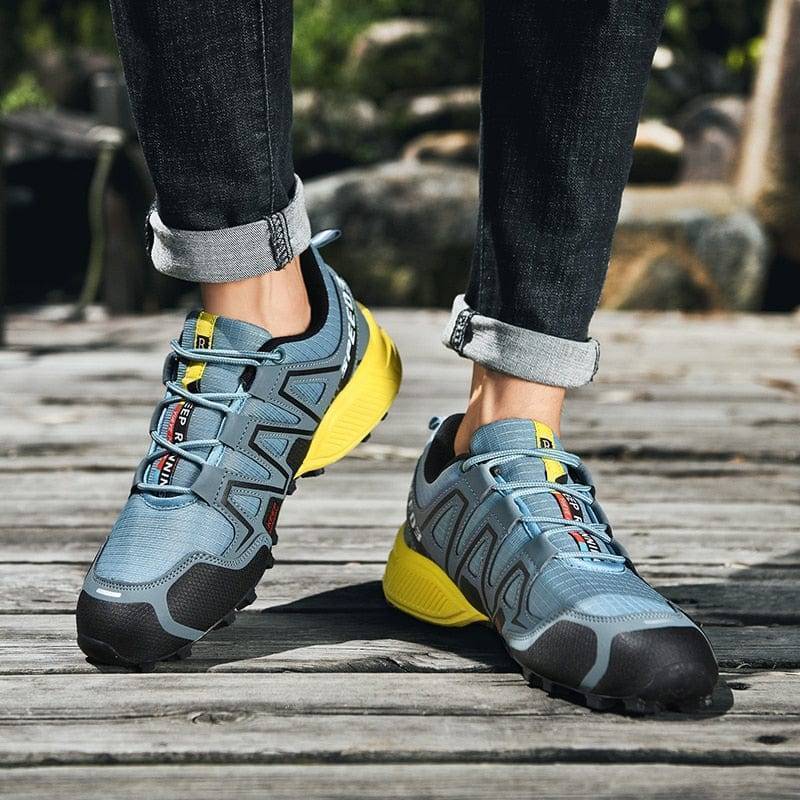 Unisex hiking shoes with robust sole, suitable for challenging trails & cycling activities.