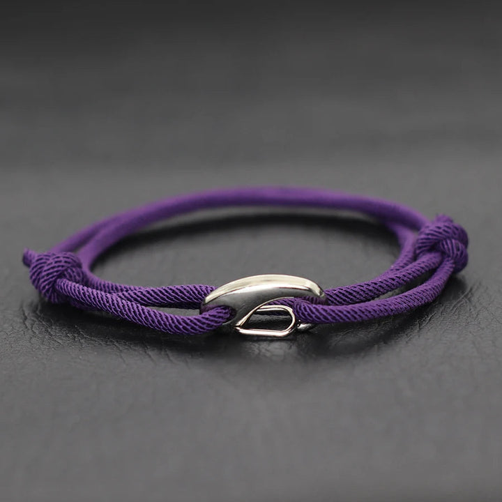 Durable unisex nautical rope bracelet with a secure hook clasp. Adjustable, waterproof, ideal for daily adventures.