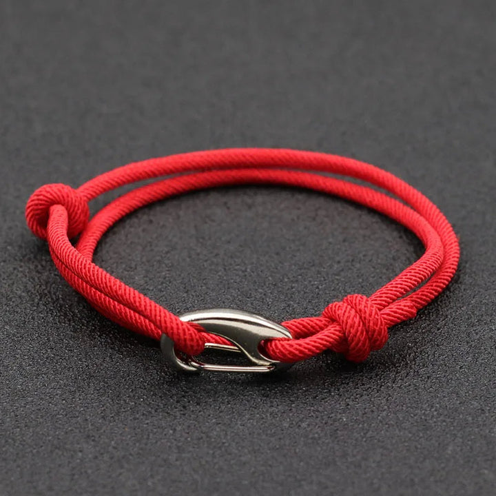Simple yet stylish unisex rope bracelet. Features a metal hook clasp, adjustable fit, and waterproof design.