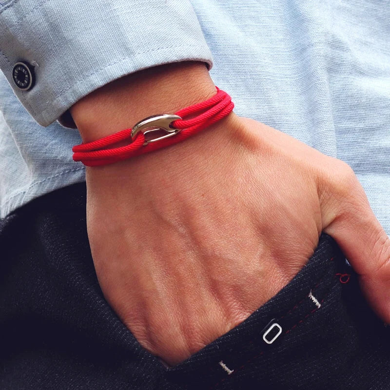 Chic unisex nautical rope bracelet with a secure hook closure. Adjustable, durable, & a perfect fashion accessory.