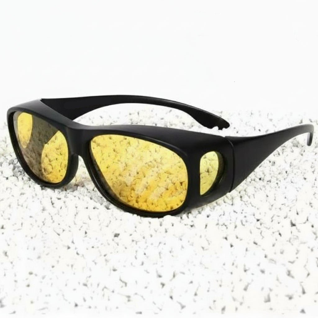 Unisex anti-glare driving glasses designed to fit over prescription eyewear, perfect for night, fog, and rain.
