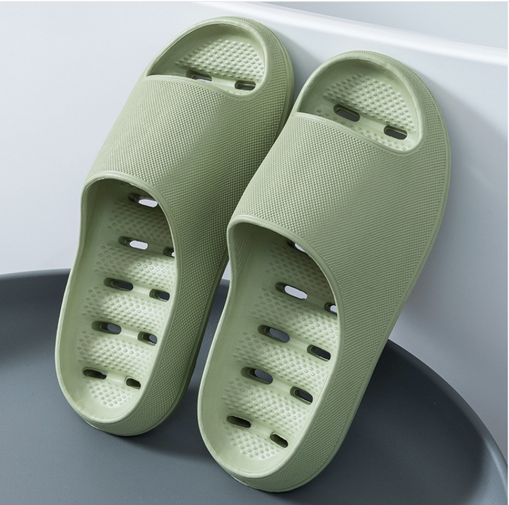 Plush, soft unisex home slippers, perfect as shower sandals or spa shoes, offering lightweight comfort indoors.