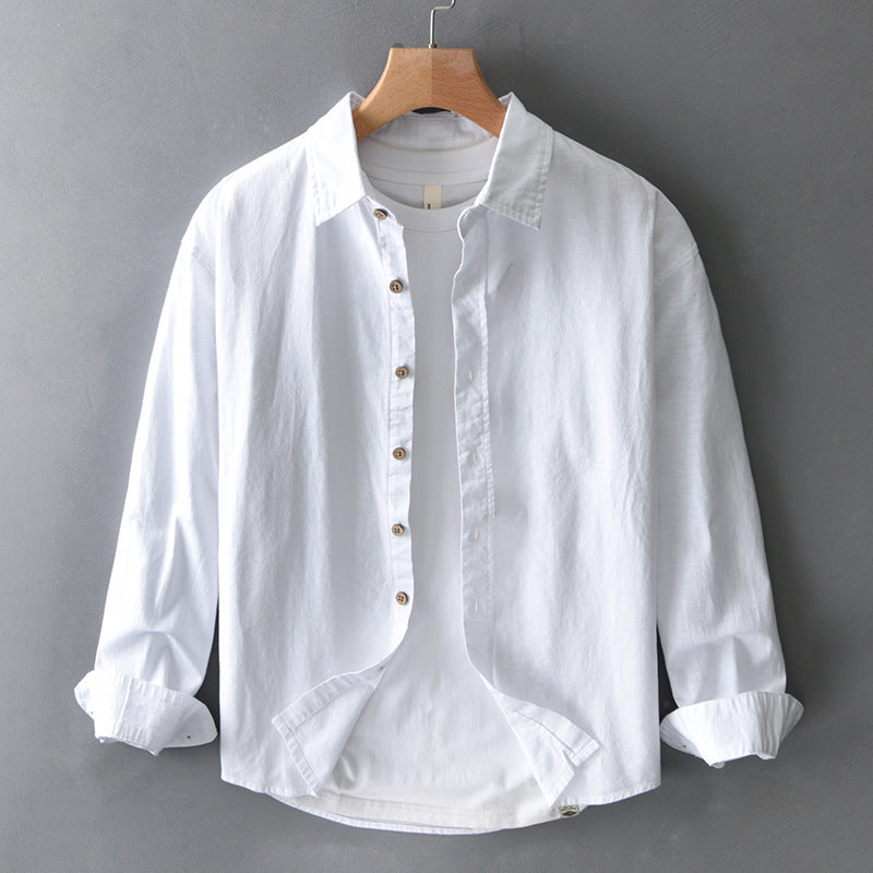 Unisex Nova relaxed fit button-up shirt in white, perfect for casual or smart casual everyday wear, versatile long sleeve.
