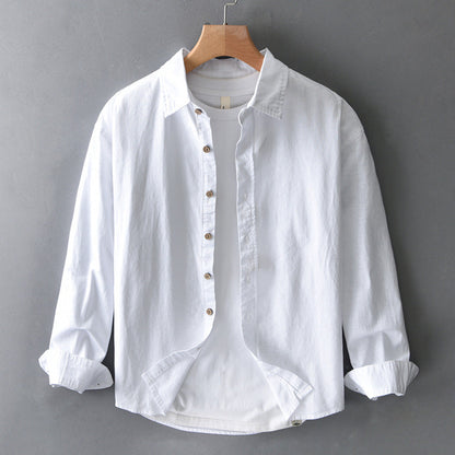 Unisex Nova relaxed fit button-up shirt in white, perfect for casual or smart casual everyday wear, versatile long sleeve.