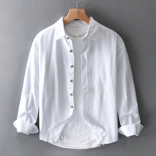 Unisex Nova relaxed fit button-up shirt in white, perfect for casual or smart casual everyday wear, versatile long sleeve.