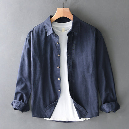 Navy blue unisex Nova relaxed fit button-up shirt, a comfortable long sleeve, great for casual or smart-casual outfits.