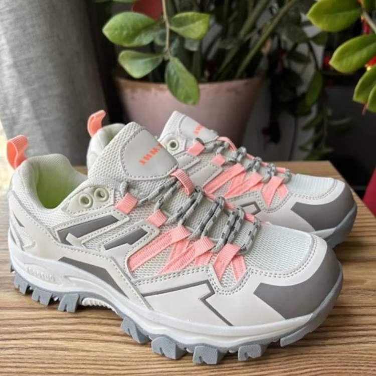 Durable unisex hiking shoes with orthopedic design, perfect for long trail walks