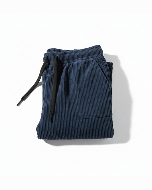 Unisex Oslo blue corduroy sweatpants, relaxed fit for ultimate comfort & casual style.