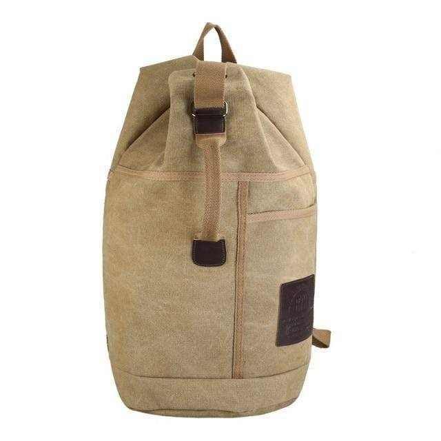 Outdoor gear: versatile blue canvas rucksack, perfect for hiking, camping, and travel.