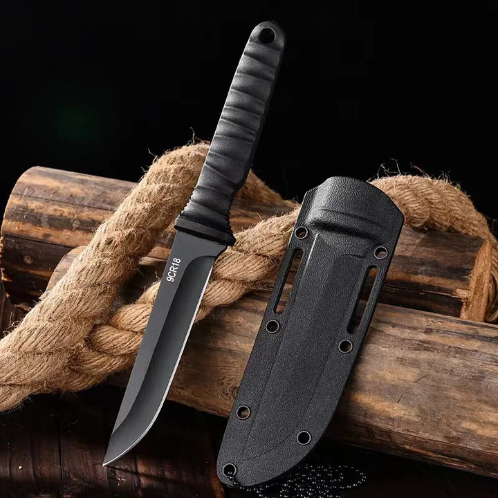 Portable high hardness steel survival blade for outdoor enthusiasts, featuring a durable self-defense design.