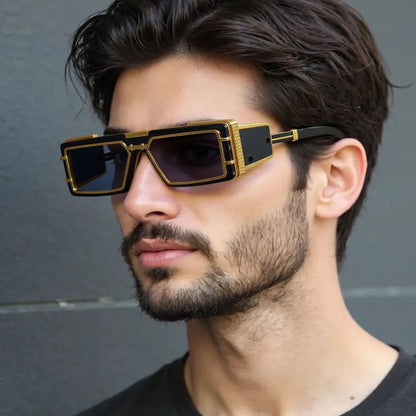 Statement unisex geometric shades for high-fashion wear. Oversized design with gold accents & UV protection.