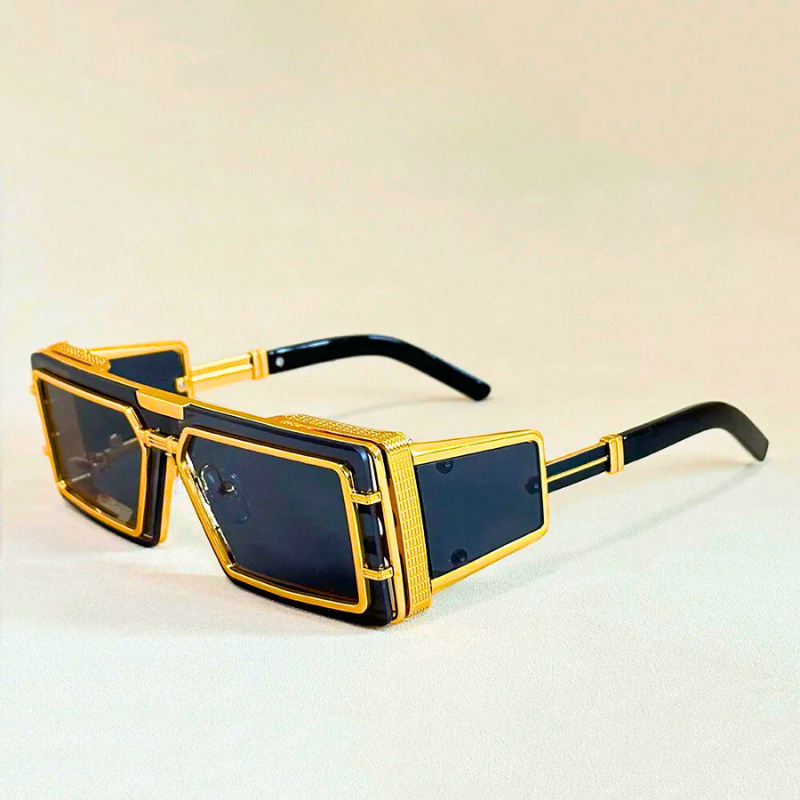 Modern geometric unisex sunglasses. High-fashion, oversized shades with gold accents & crucial UV protection.
