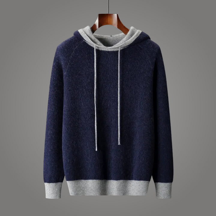 Cozy oversized knit hoodie with stylish contrast trim, a relaxed fit for unisex everyday comfort & style.