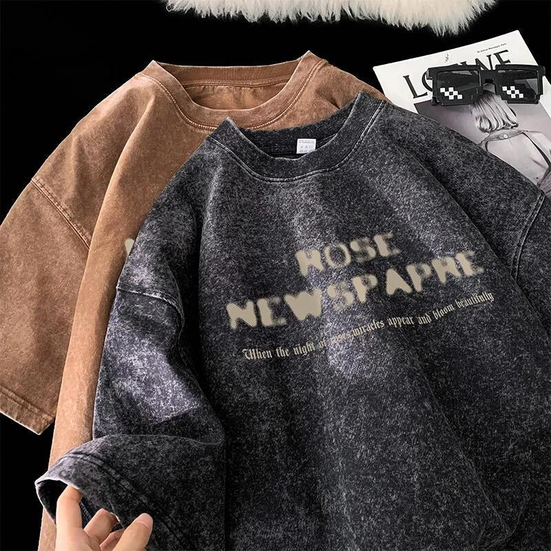 Vintage-inspired rose washed graphic tee, oversized & unisex for streetwear style.