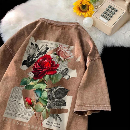 Soft rose washed graphic t-shirt, oversized unisex design with a vintage feel.