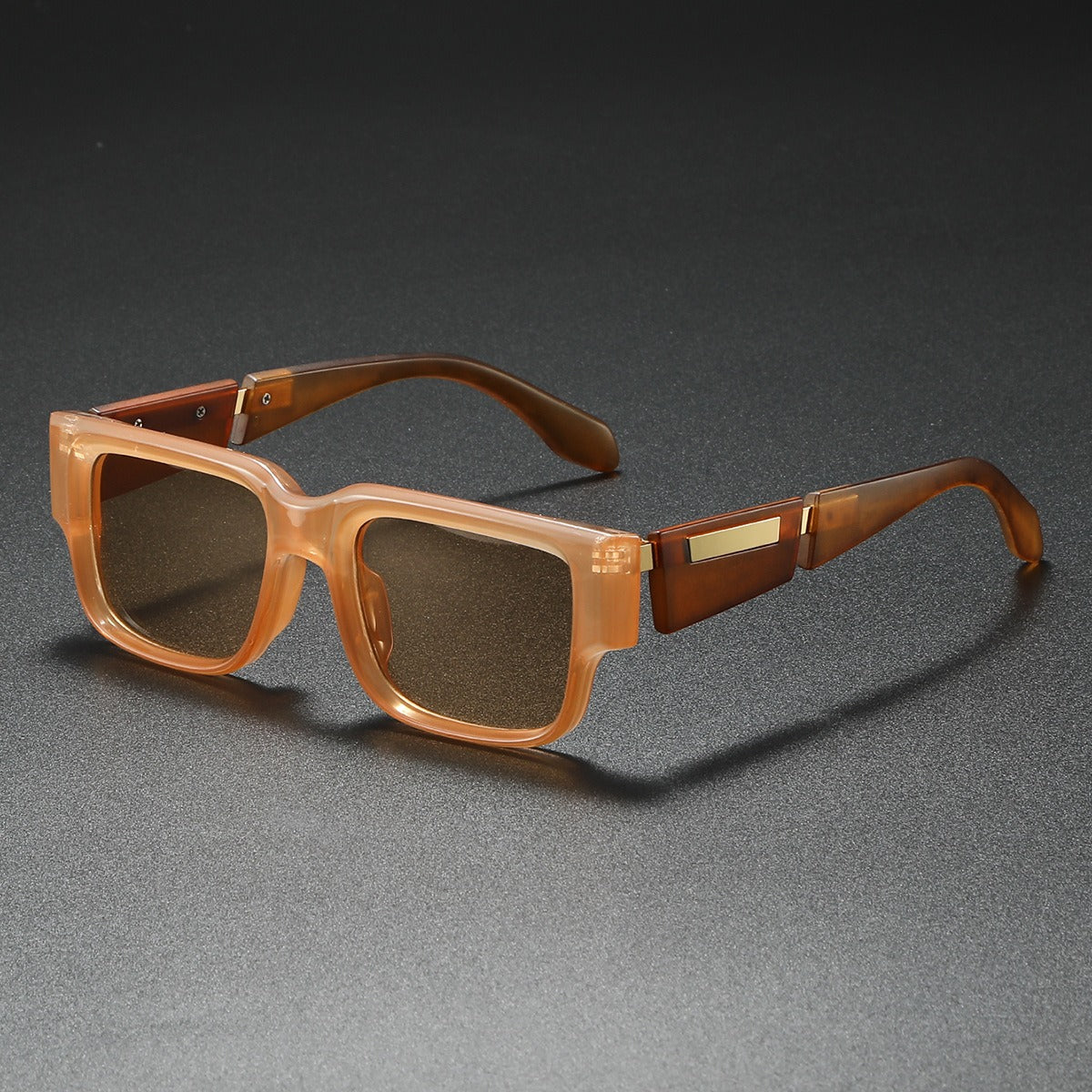 Unisex oversized square sunglasses with black frames, offering fashion-forward style & essential UV400 eye protection.