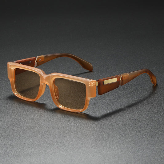 Unisex oversized square sunglasses with black frames, offering fashion-forward style & essential UV400 eye protection.