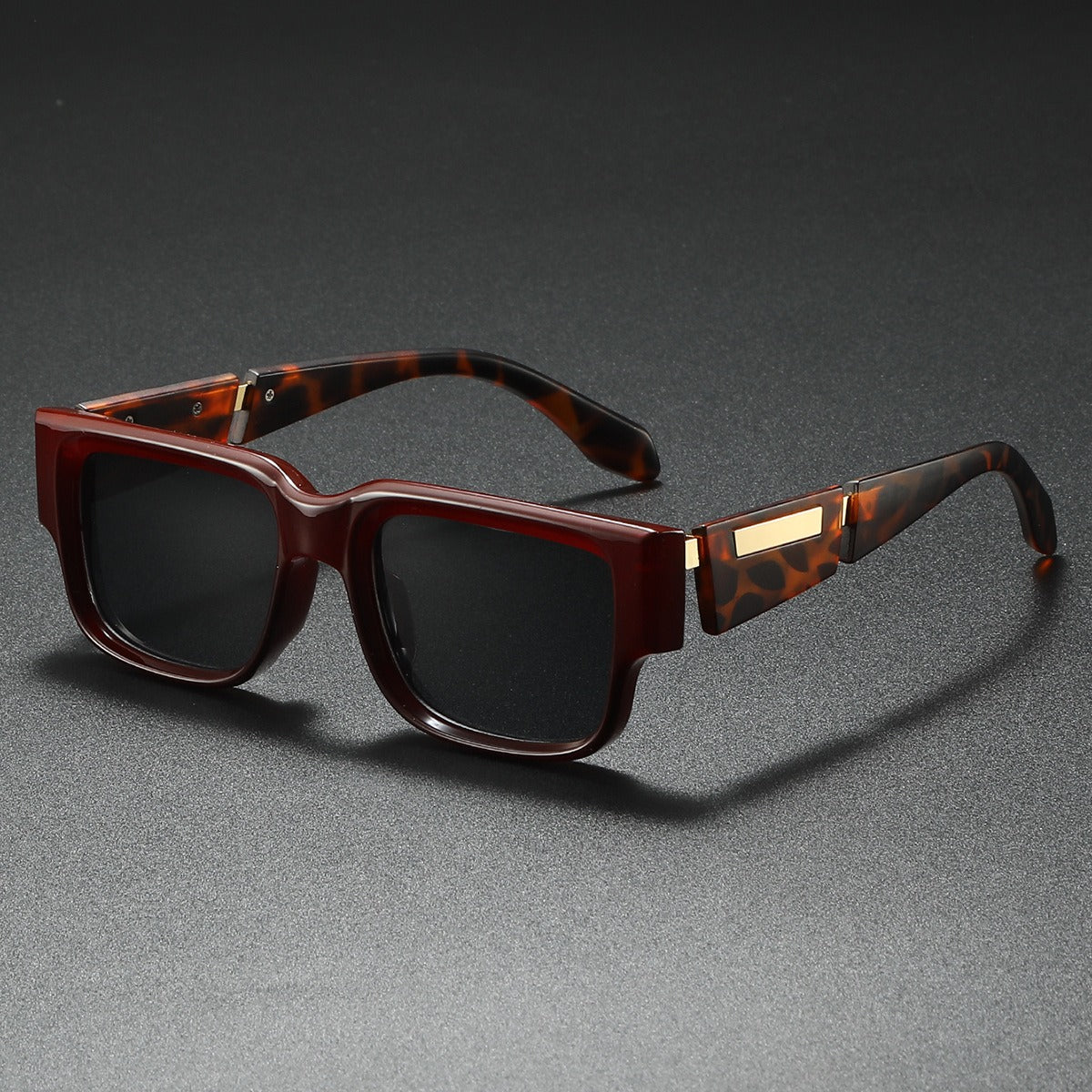 Classic black oversized square unisex sunglasses, a versatile eyewear choice for sophisticated style and UV protection.