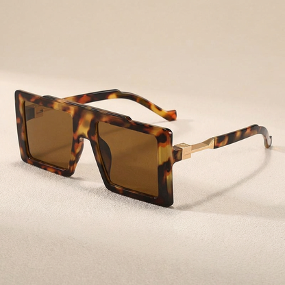 Fashion-forward oversized square sunglasses, unisex design, offering UV400 eye protection.