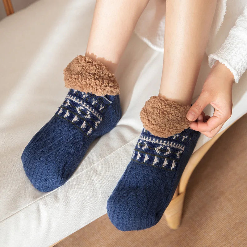 Cozy thermal lounge socks, plush and soft, with secure non-slip grip for home wear.
