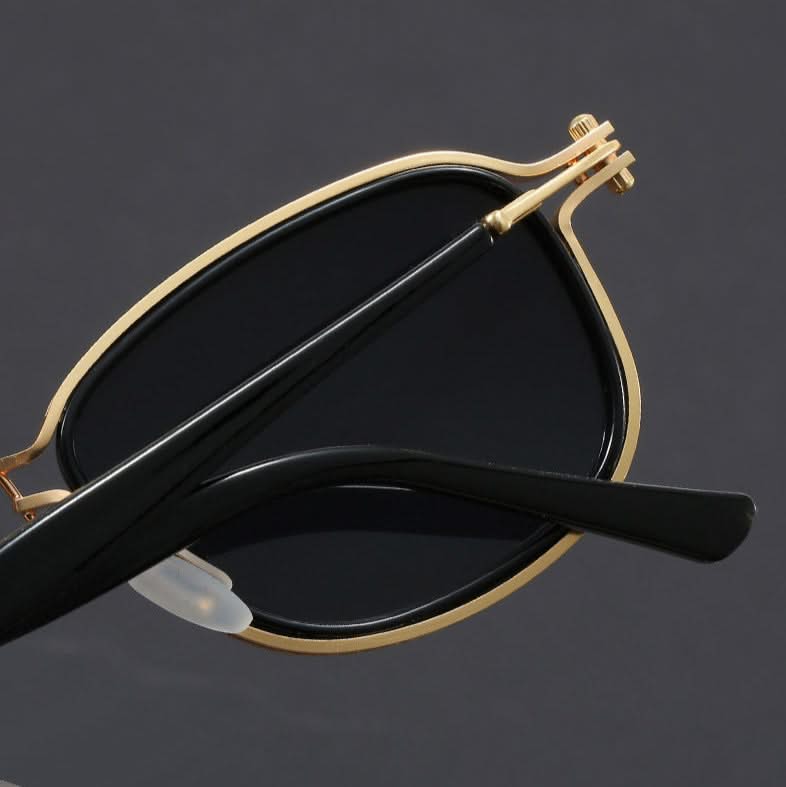 Unisex polarized sunglasses with a sleek, lightweight metal frame; offers full UV protection and anti-glare.