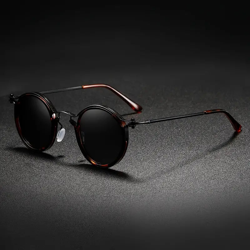 Unisex polarized sunglasses for ultimate glare reduction & UV protection, sleek metal frame.