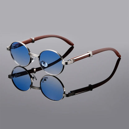 Stylish unisex sunglasses featuring a sleek metal frame & polarized UV400 lenses. Modern fashion eyewear accessory.