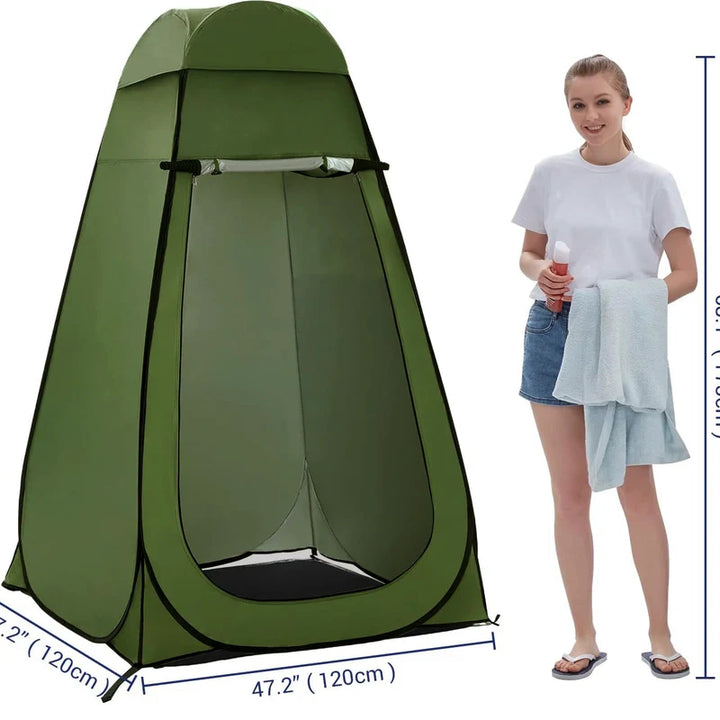 Person zipping up the door of a Pop-Up Full Height Privacy Tent at a campsite