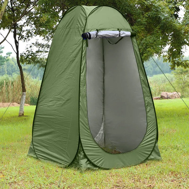 Pop-up shelter for camping, beach, or events, side view illustrating stability, green color