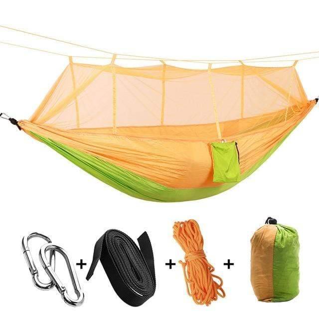 Adventure-ready portable hammock with a robust mosquito net, ensuring peaceful nights in the wild.