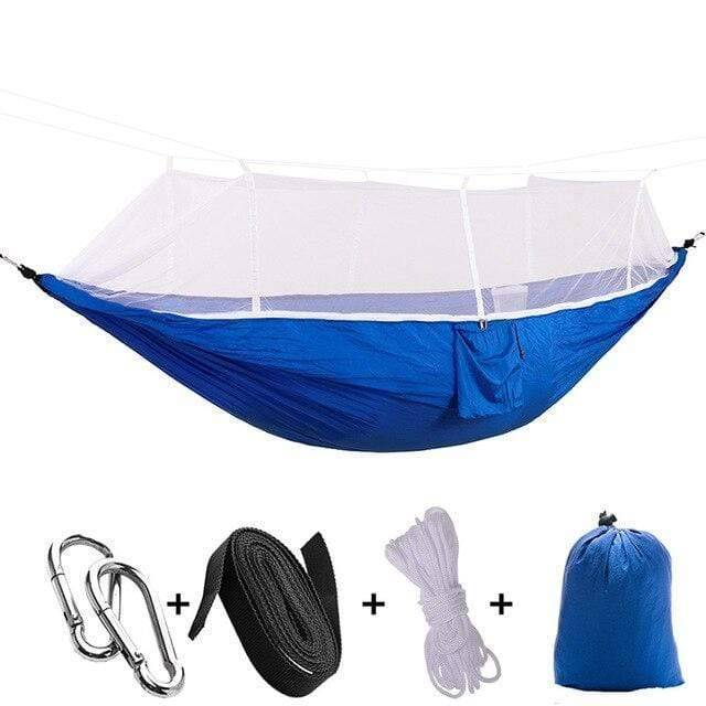 Camping hammock showing its compact packed size next to the deployed mosquito net for travel.