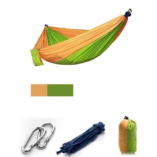 Unisex outdoor hammock kit showing the included mosquito net and travel bag for convenience.