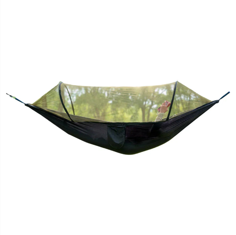 Lightweight travel hammock with integrated bug net, ideal for hiking and camping.