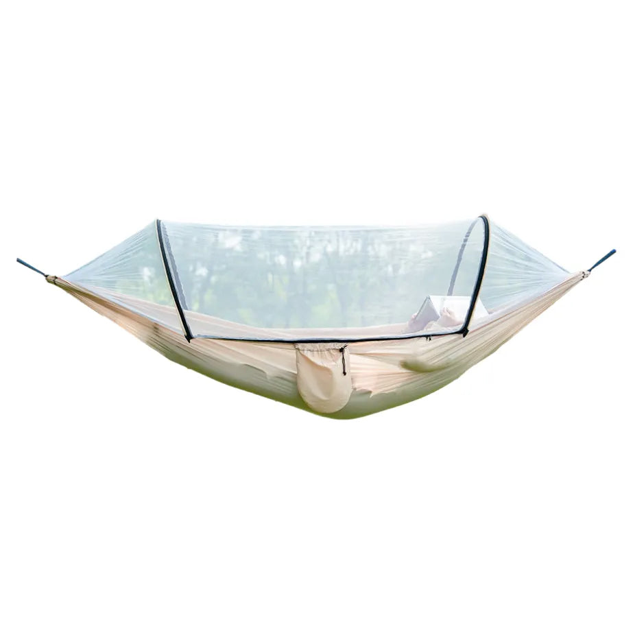 Compact camping hammock with mosquito net, perfect for backpacking and travel.